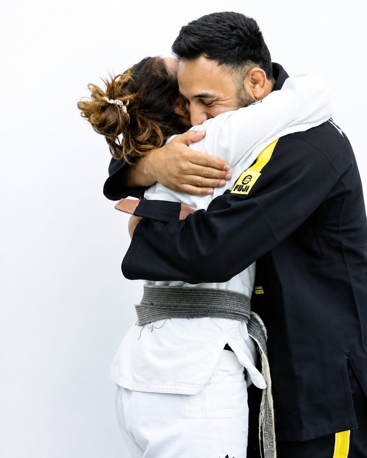 Kevin and Whitney Hosseini with their family — Ramona MMA Center is family-owned and family-operated