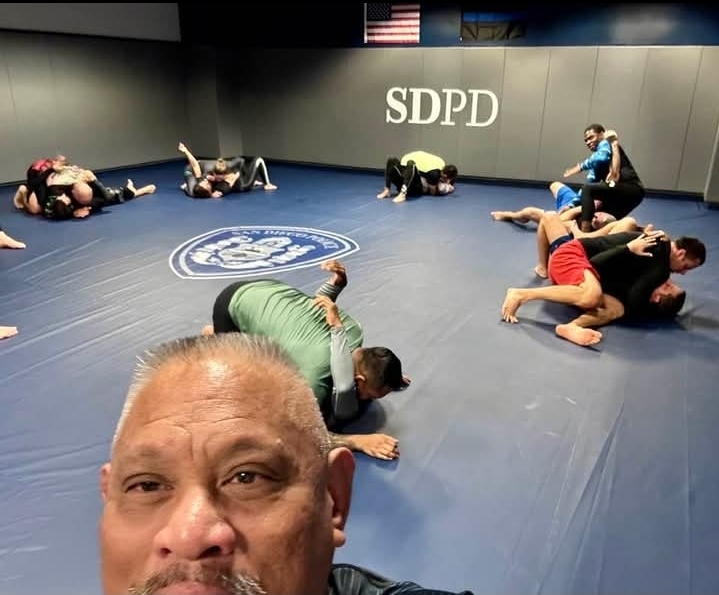 Coach Romeo De Los Reyes leading Adopt a Cop BJJ law enforcement training at Ramona MMA Center
